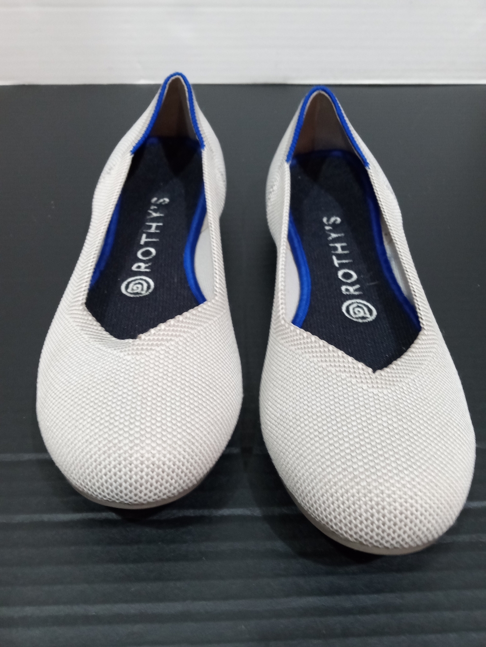 Rothy's Knit Ballet Flats in Light Beige with Blue Trim